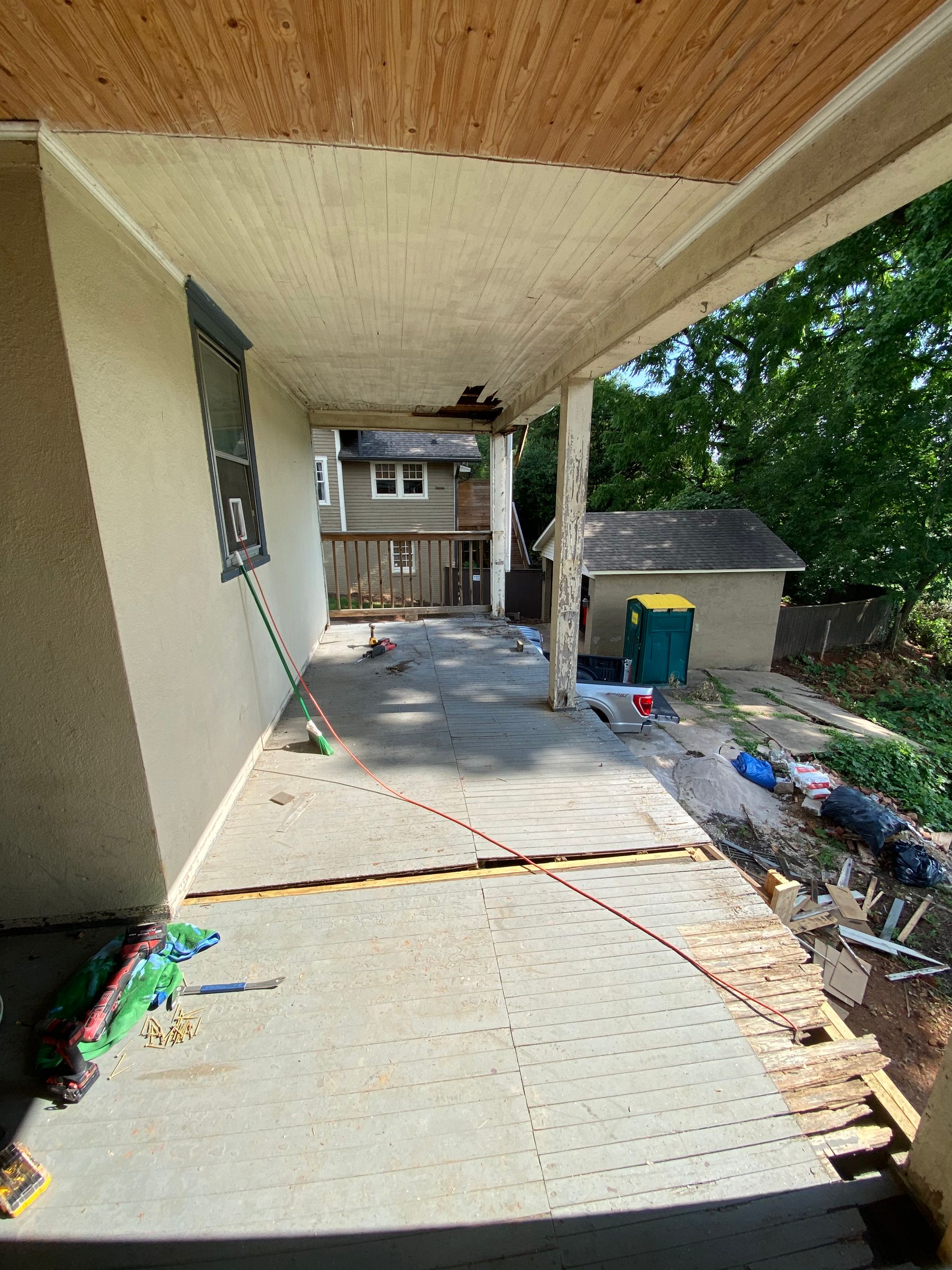 Worn and rotten rear porch