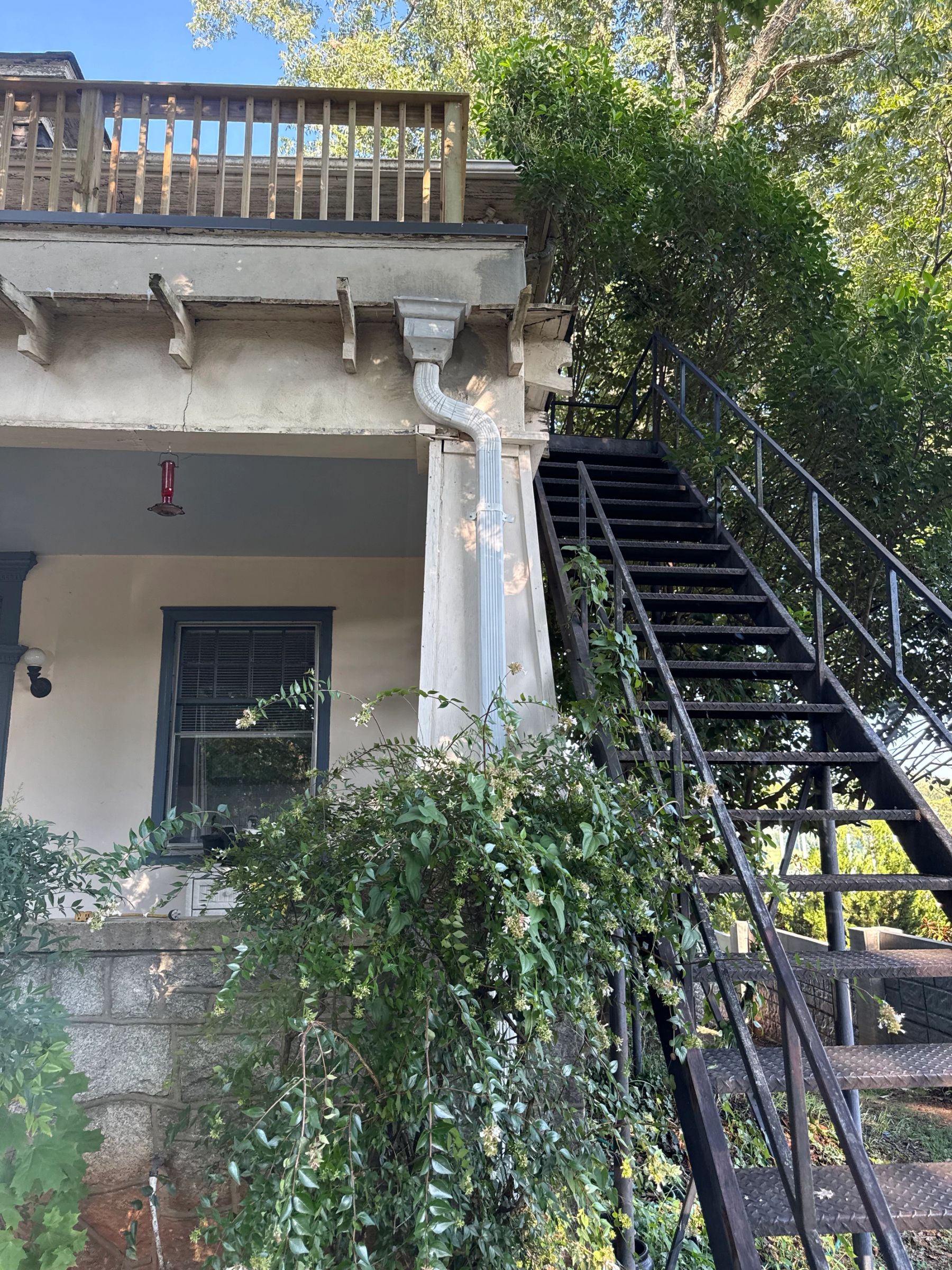Newly relocated and reworked gutter downspouts